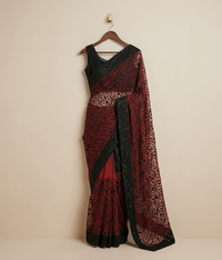 Black and orange Embroidered Jaal Net Saree