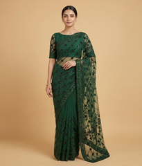 Bottle green sequin net saree