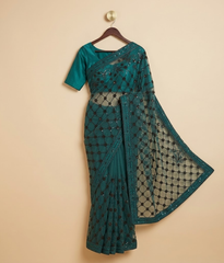 Teal sequin net saree