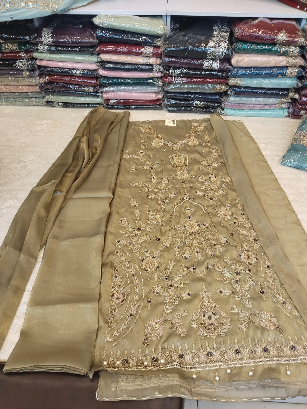 Mehndi Raw silk suit with tilla and dabka work
