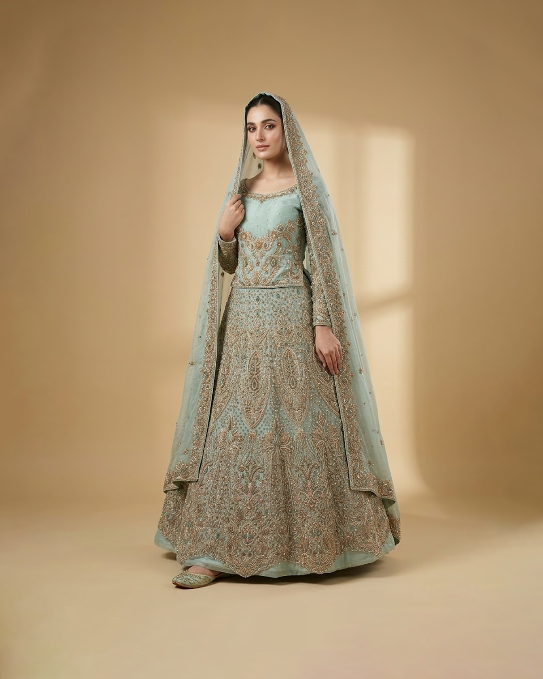 Blue bridal lehnga with heavy dabka and tilla work